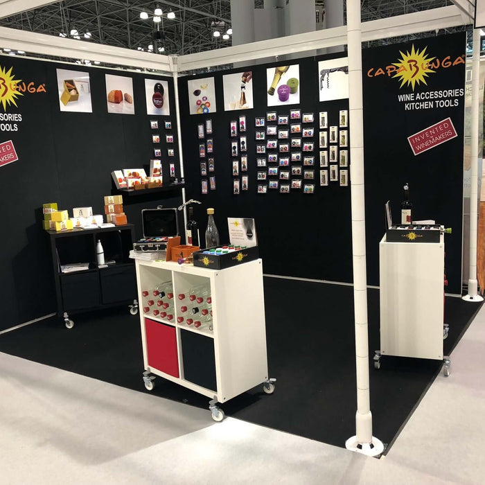 Trade Show Season = Harvest Time at a wine accessories kitchen tools booth.