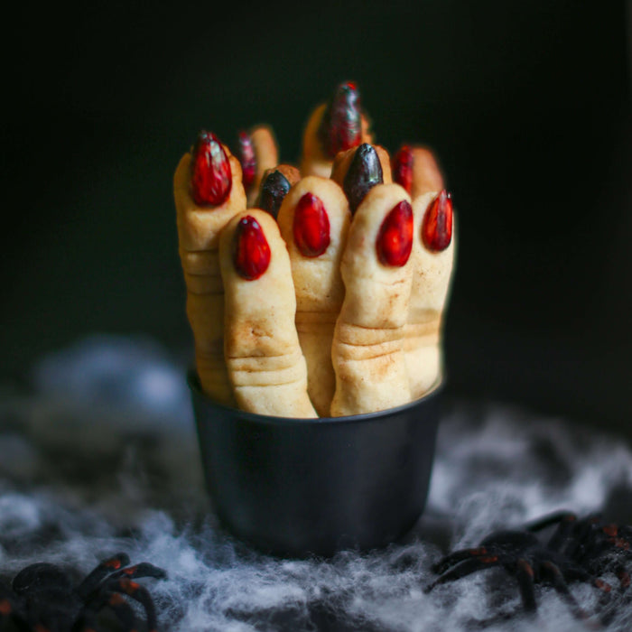 Scary Finger Cookies Recipe featuring spooky cookies shaped like fingers with creepy nail designs.