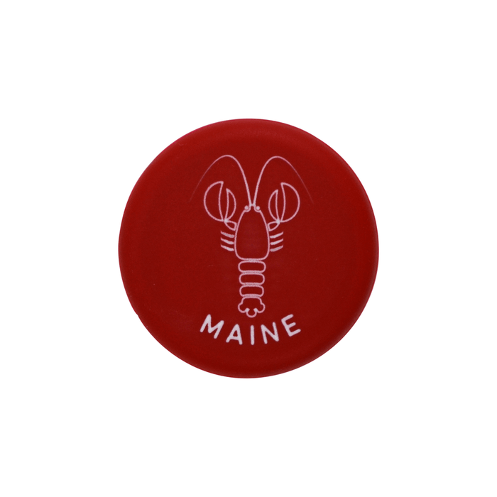 Red silicone wine cap featuring a lobster design and the word 'MAINE' for coastal-themed wine lovers.