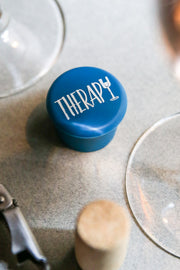 Therapy Silicone Wine Cap in blue, perfect for keeping wine fresh and adding a fun touch to gatherings.