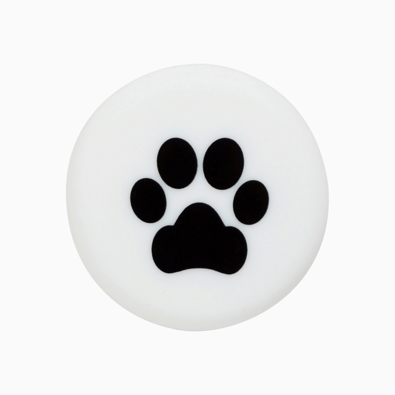 Silicone wine cap featuring a black paw print design on a white background.