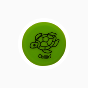 Green silicone wine cap featuring a turtle design with the text 'Chillin''