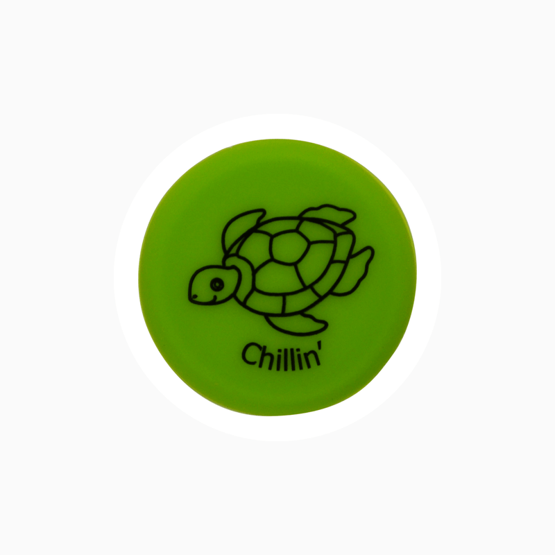 Green silicone wine cap featuring a turtle design with the text 'Chillin''