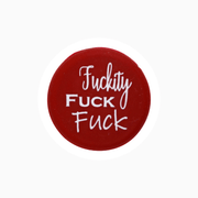 Red silicone wine cap featuring the humorous text 'Fuckity Fuck Fuck' for casual wine lovers.