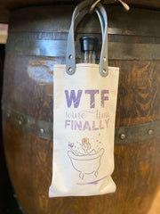 Canvas wine tote with fun graphics saying 'WTF wine time FINALLY', ideal for gifting and reusable.