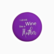 Purple silicone wine cap with the text 'I drink like a Wine Mother' for stylish wine preservation.