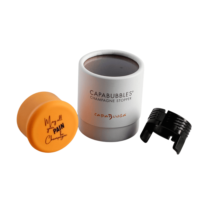 CapaBubbles Champagne Stopper in white with orange cap reading 'May All Your Pain Be Champagne' and black collar to attach around the neck of the bottle