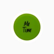Green silicone wine cap with the text 'Me Time' for sealing bottles.