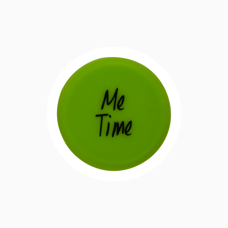 Green silicone wine cap with the text 'Me Time' for sealing bottles.