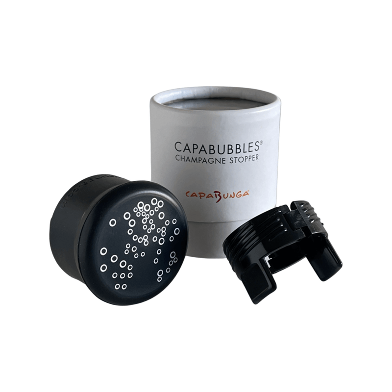 CapaBubbles champagne stopper with black bubbly design in packaging for preserving sparkling wine.