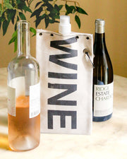 Wine Design 750ml canvas canteen with wine bottles on display in a stylish setting.