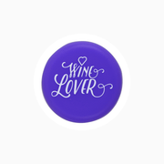Purple silicone wine cap with 'Wine Lover' text design for wine bottle sealing.
