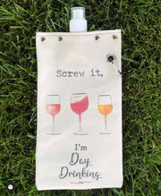 Day Drinking canvas canteen with graphic of wine glasses and text, perfect for carrying beverages.