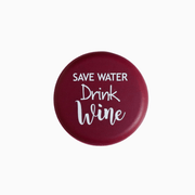 Save Water, Drink Wine silicone wine cap with a burgundy background and white text design.